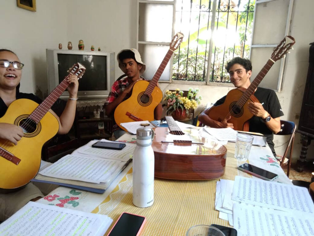 songwriting students at the National School of Arts in Cuba enjoy their new Epiphone acoustic guitars.