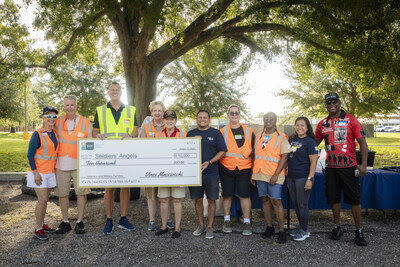Florida Food Products executives and Soldiers’ Angels volunteers present $10,000 donation check at Lake Baldwin VA Clinic.