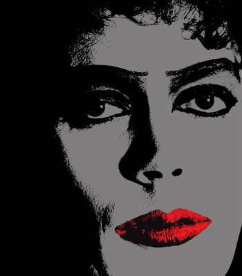 Vintage glam rock photography aesthetic of Tim Curry as Frank-N-Furter, fishnet stockings, spotlight, smoky stage. (c) Estate of Mick Rock 1974, 2025