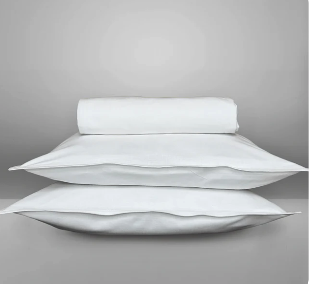 Truce Queen Bundle white bedding styled in a modern minimalist bedroom